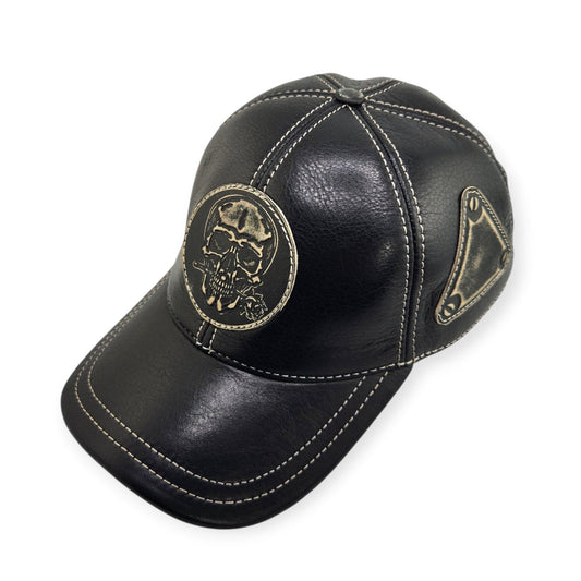Black leather cap with skull design on a white background