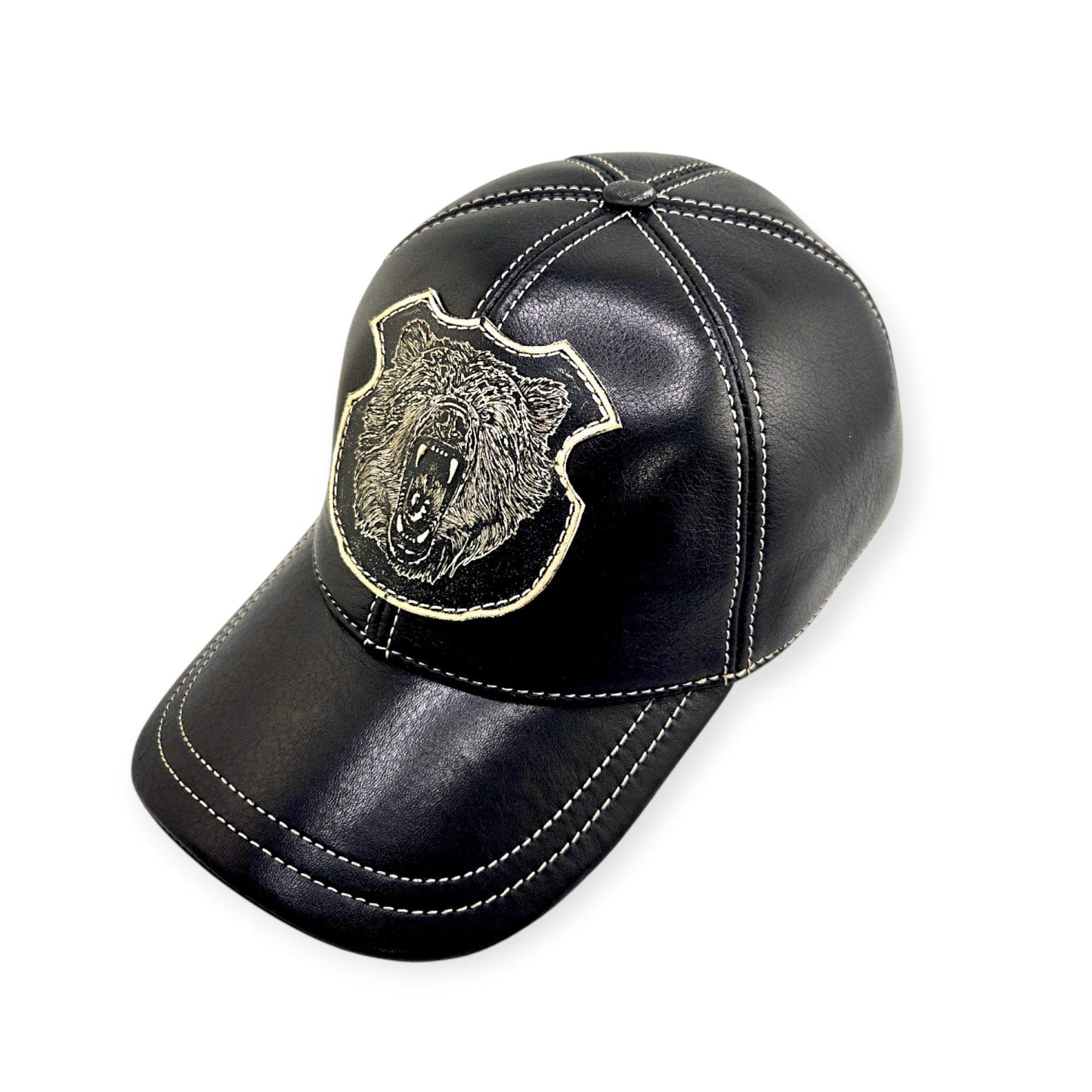 Black leather cap with a bear emblem on a white background
